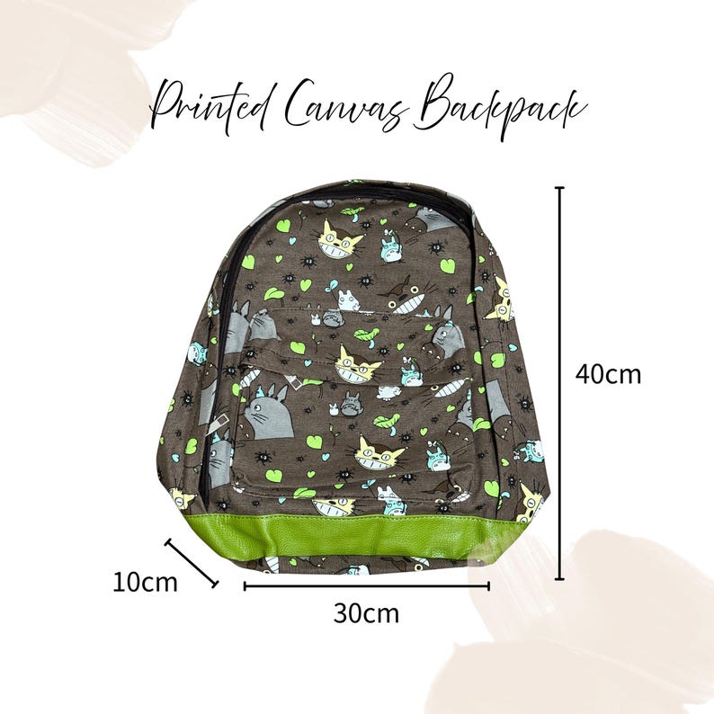 May include: A brown canvas backpack with a cat pattern, measuring 10cm deep, 30cm wide, and 40cm tall. The backpack has a green bottom and the text "Printed Canvas Backpack" at the top.