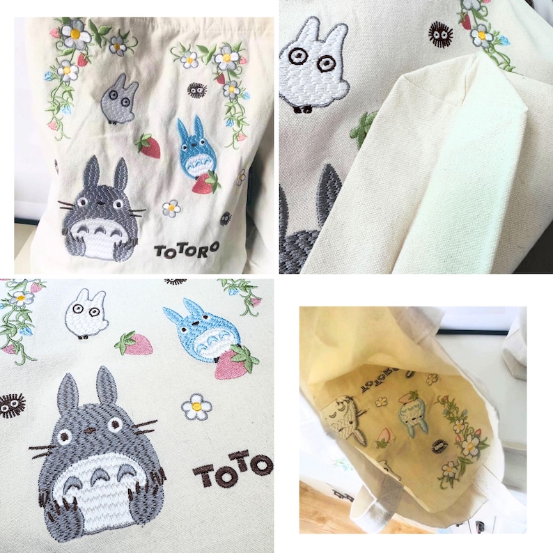 May include: A white canvas tote bag with embroidered images of Totoro, a small white bunny, and a blue cat-like creature. The bag has the word "TOTORO" embroidered on the front. The inside of the bag is lined with a yellow fabric with a similar embroidery design.