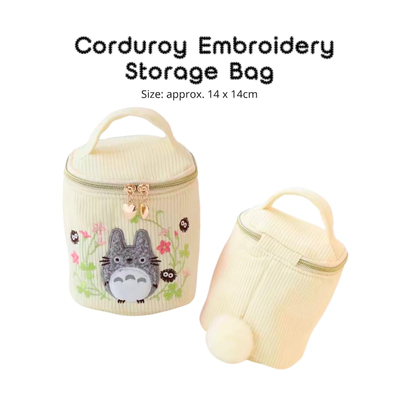 May include: Two cream-colored corduroy storage bags with zipper closures and handles. One bag features an embroidered cartoon character with floral accents. The text "CORDUROY EMBROIDERY STORAGE BAG" is above the bags. Size: approx. 5.5 x 5.5 inches.