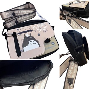 May include: A beige and black crossbody bag with a cartoon Totoro design. The bag has a flap closure and a strap with the text "I'm a sleepyhead" and "My Neighbor Totoro". The bag is suitable for carrying small items.