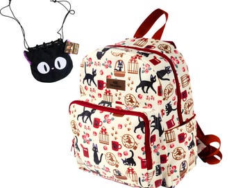 May include: A cream-colored backpack featuring a repeating pattern of black cats, birdcages, red mugs, and pink flowers, with red zippers and straps. A small black drawstring pouch with a cat face design is included as a separate accessory.