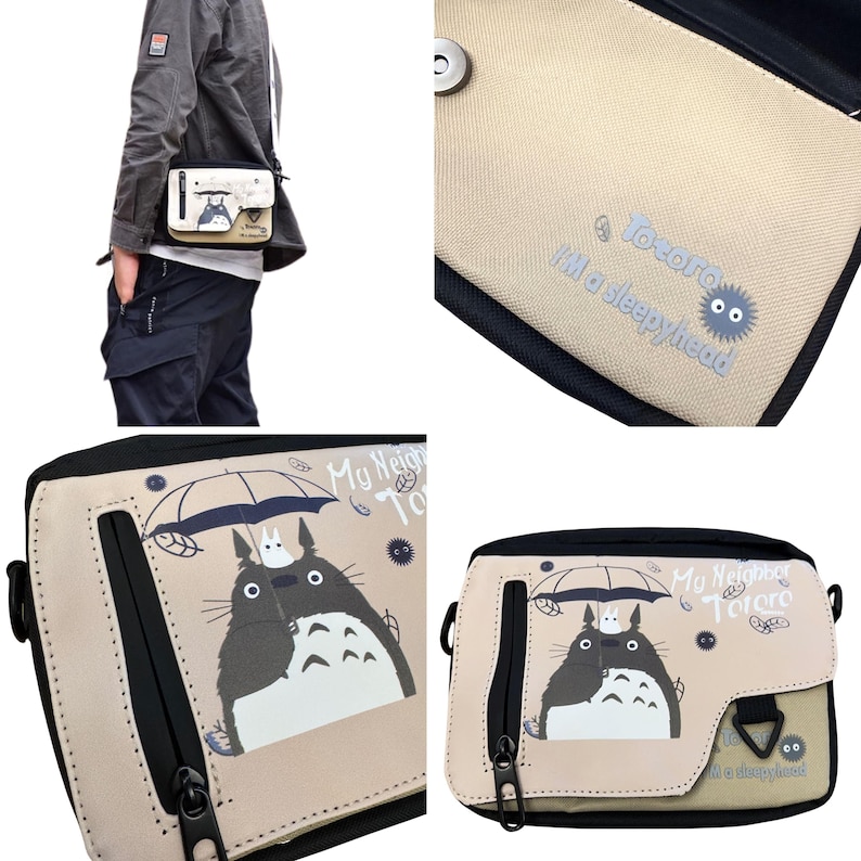 May include: A beige and black crossbody bag with a Totoro graphic from My Neighbor Totoro. The bag has a zip closure, a flap with the text "My Neighbor Totoro", and the phrase "I'm a sleepyhead".