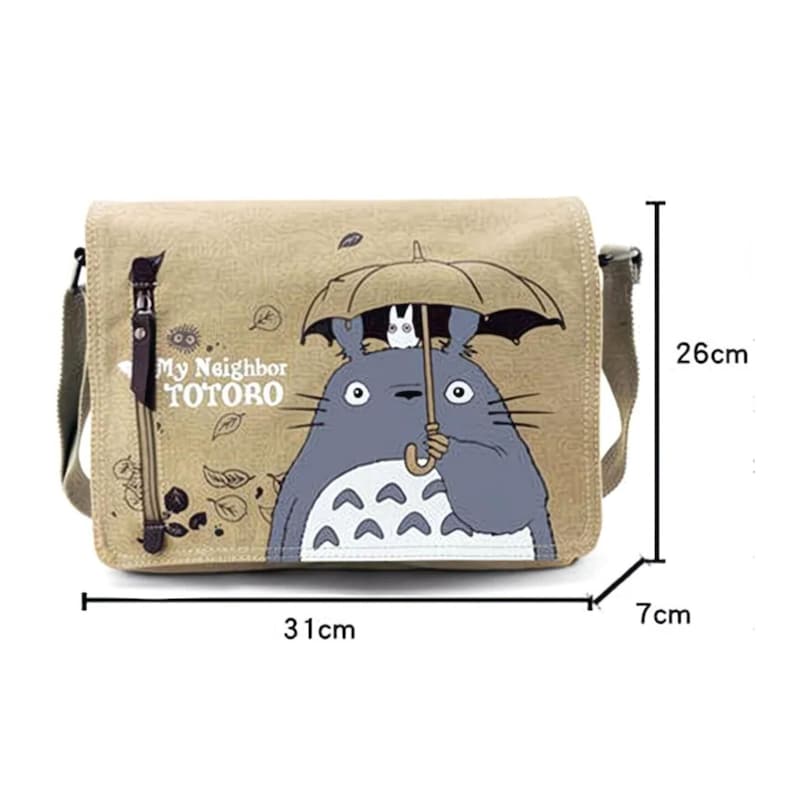 May include: Beige messenger bag featuring a graphic of Totoro holding an umbrella, with the text "My Neighbor Totoro." The bag measures 12.2 inches wide, 10.2 inches high, and 2.8 inches deep. It has a long adjustable strap and a flap closure.