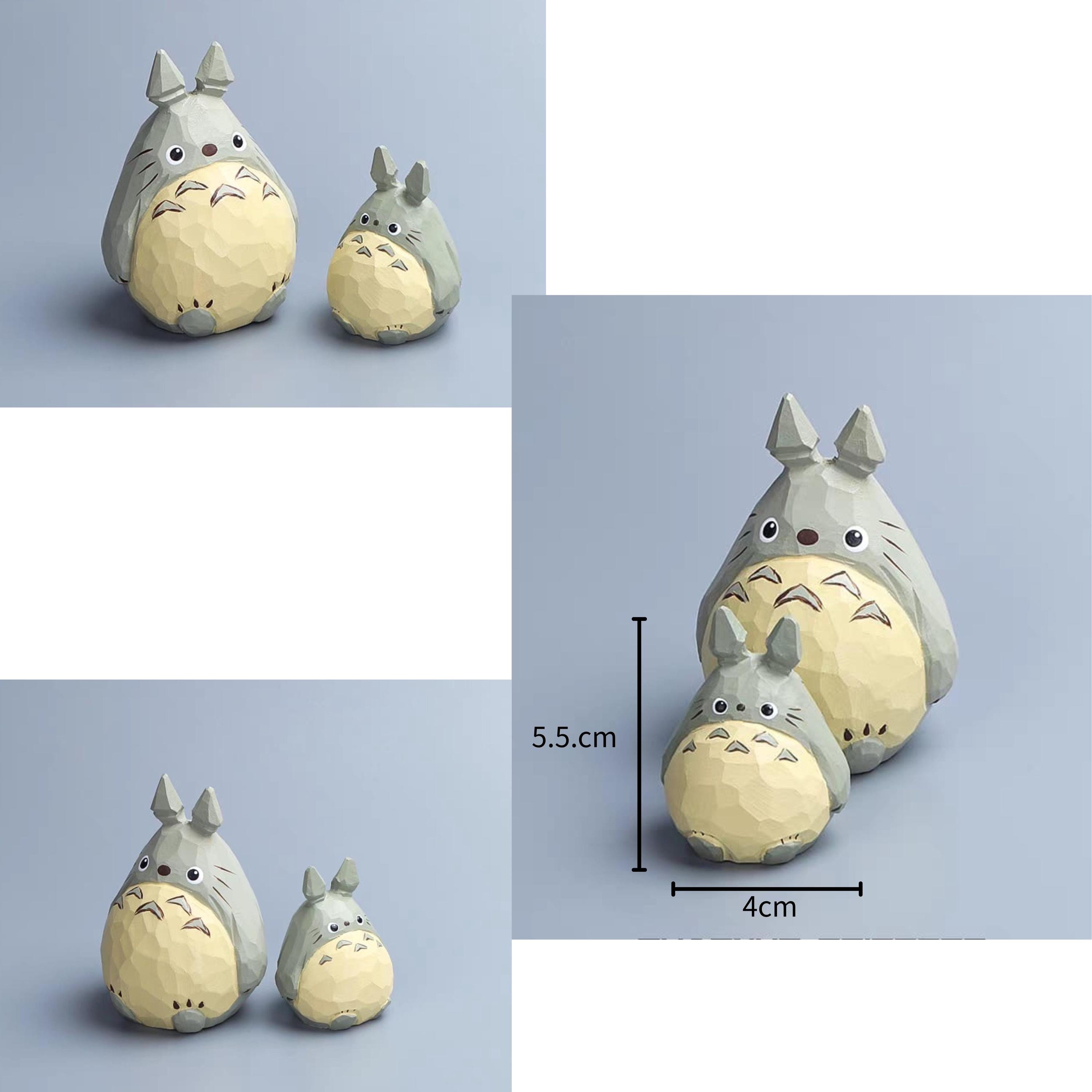 木製トトロフィギュア J.ナリカ作 ジブリと、工芸。」 一刀一刀、丁寧に彫り出され、 子どもたちをそっと