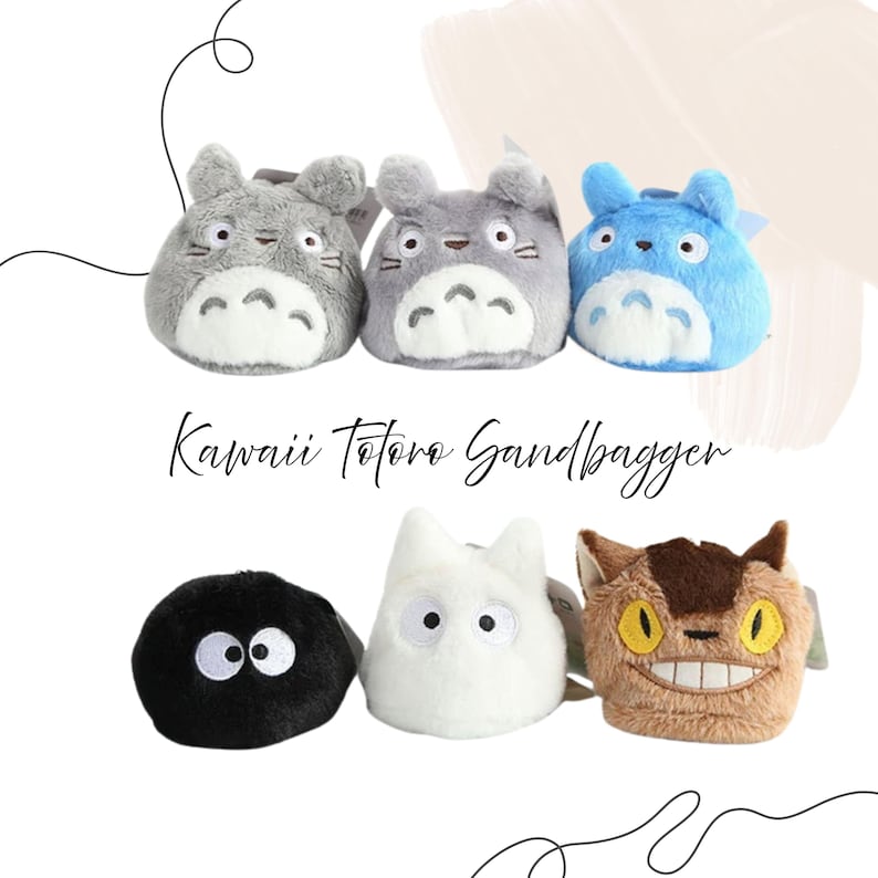 May include: Six plush character toys in the shape of cartoon creatures. The top row features three Totoro-like figures in grey and blue. The bottom row includes a black soot sprite, a white character, and a brown cat-like figure. The text "Kawaii Totoro Sandbagger" is below.