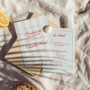 May include: A Bachelorette Weekend invitation with light blue and white stripes, featuring the text "Chandler Wood" and event details. A seashell and sliced lemons are also present.