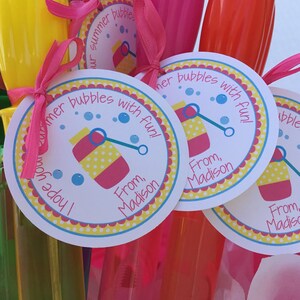 May include: A set of colorful bubble wands with attached tags that read "Summer bubbles with fun!" and "From, Madison".