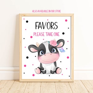 May include: A printable sign with a black and white cow with a pink flower crown and a blue butterfly. The sign says "Favors Please Take One" in black text with pink polka dots on a white background.