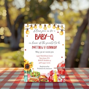 May include: A baby shower invitation featuring a watercolour illustration of a picnic scene. The invitation is for a "Baby-Q" in honour of Matthew & Kennedy. The event is scheduled for 30 May at 12:00 pm at 1557 Markham Lane, San Jose, CA. The RSVP contact is Debbie at 408-555-1212. The invitation also includes information about gift registries at Walmart and Amazon.