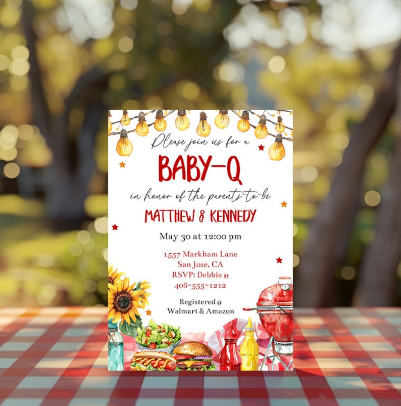 May include: A baby shower invitation featuring a watercolour illustration of a picnic scene. The invitation is for a "Baby-Q" in honour of Matthew & Kennedy. The event is scheduled for 30 May at 12:00 pm at 1557 Markham Lane, San Jose, CA. The RSVP contact is Debbie at 408-555-1212. The invitation also includes information about gift registries at Walmart and Amazon.