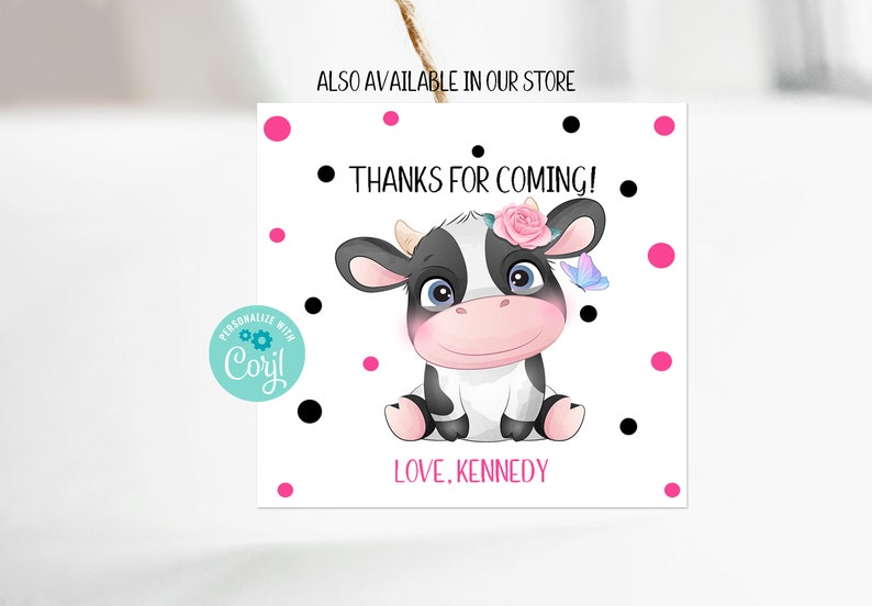 May include: A white thank you card with black polka dots and pink dots. A cartoon cow with a pink flower crown and a blue butterfly is in the center of the card. The text on the card reads "Thanks for coming! Love, Kennedy".
