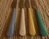 Four GIBSON Knives goes with Fiestaware