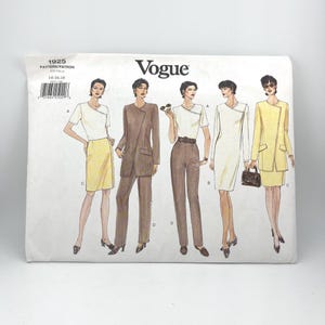 May include: Vogue sewing pattern envelope featuring illustrations of women's fashion designs. The designs include a skirt suit, a pantsuit, a dress, and a coat dress. The envelope is white with the Vogue logo and pattern details.