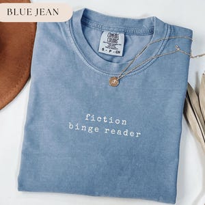 May include: A set of three ceramic mugs with a speckled, matte finish. The mugs are in shades of cream, light gray, and dark gray. Each mug has a simple, minimalist design, perfect for coffee or tea.