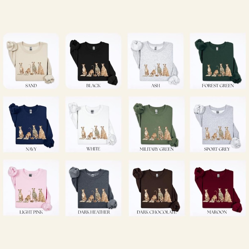 May include: A collection of crewneck sweatshirts in various colors, including sand, black, ash, forest green, navy, white, military green, sport grey, light pink, dark heather, dark chocolate, and maroon. Each sweatshirt features a dog graphic.