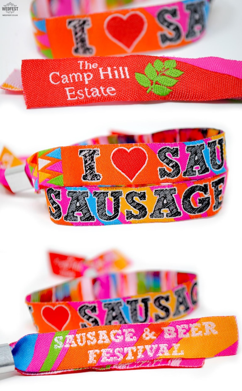 May include: Colorful woven wristbands with the text "I love sausage" and "Sausage & Beer Festival". The wristbands are red, orange, yellow, green, blue, and pink.