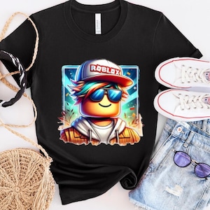 May include: A black t-shirt with a graphic of a Roblox avatar wearing a blue and red hat with the word 'ROBLOX' on it. The avatar has rainbow hair, sunglasses, and a yellow face. The avatar is wearing a brown jacket and is standing in front of a colorful background.