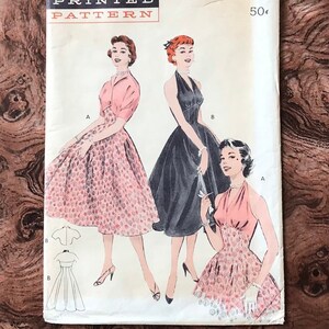 1950er Jahre Schnittmuster Butterick 6993 / Empire Neckholder Kleid mit V-Ausschnitt & Bolero mit Flügelkragen / Sexy Fit and Flare / Größe 14 Brustumfang 82 cm