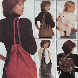 May include: McCall's Fashion Accessories pattern envelope. The cover features images of various bag designs, including a red drawstring bag, a patterned tote, and a small backpack. The text "8259" is visible on the right side of the envelope.