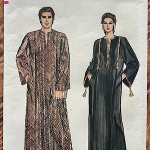 May include: A set of three ceramic mugs with a speckled, matte finish. The mugs are in shades of cream, light gray, and dark gray. Each mug has a simple, minimalist design, perfect for coffee or tea.