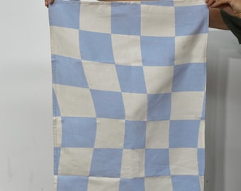 Paño de cocina de aspecto deformado de color azul