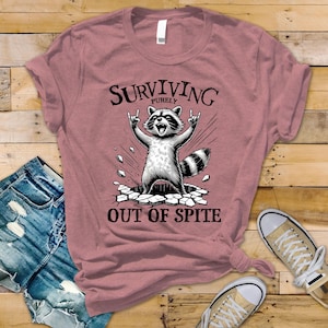 Funny RaccoonT-Shirt - Surviving Purely Out of Spite Design on Bella & Canvas Premium Tee - Funny Graphic Tee with Tracked UK Post