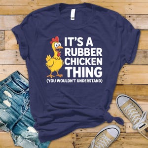 Funny Slogan T-Shirt - Its A Rubber Chicken Thing Design on Bella & Canvas Premium Tee - Funny Graphic Tee with Tracked UK Post