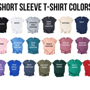 a collection of short sleeve t-shirt colors, including black, white, gray, beige, navy, pink, blue, teal, peach, maroon, and green.