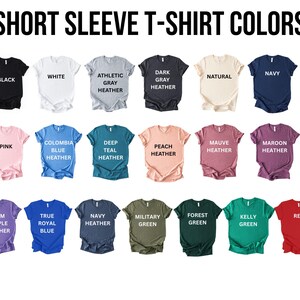 a collection of short sleeve t-shirt colors, including black, white, gray, beige, navy, pink, blue, teal, peach, maroon, and green.