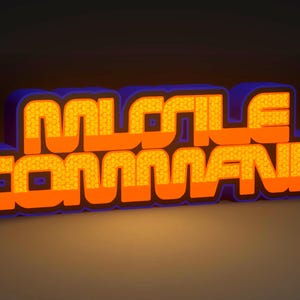 May include: A 3D rendering of the words "MISSILE COMMAND" in orange, with a textured pattern, outlined in blue and black. The text is illuminated against a dark background, creating a retro, arcade game aesthetic.