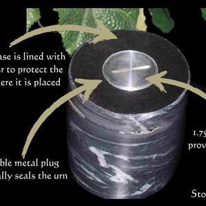 May include: A black and white marble urn with a 1.75-inch hole for access. The urn's base is lined with velvet paper to protect surfaces. A screwable metal plug hermetically seals the urn.
