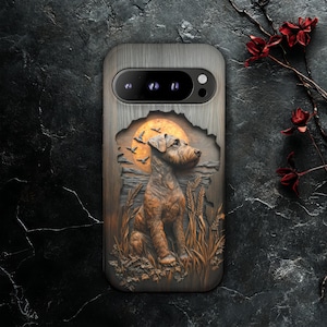 May include: A wooden phone case featuring a detailed relief of a dog sitting in a field with a sunset and flying birds in the background. The case has a camera cutout and a wood grain texture.