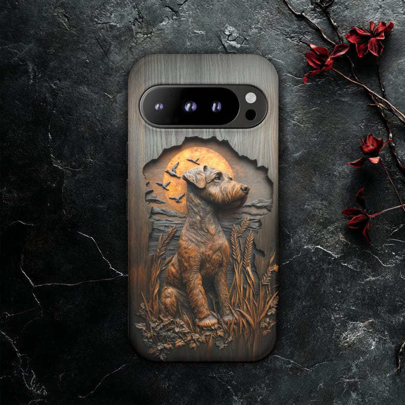 May include: A wooden phone case featuring a detailed relief of a dog sitting in a field with a sunset and flying birds in the background. The case has a camera cutout and a wood grain texture.