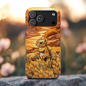 May include: A phone case featuring a stained-glass style illustration of a chipmunk in a natural setting. The case has a yellow and brown color scheme, with the chipmunk surrounded by autumn leaves and rocks. The phone's camera lenses are visible.