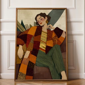 May include: A framed art print featuring a seated figure in a patchwork coat and green pants. The artwork has a warm color palette with shades of brown, orange, and green. The figure is wearing a striped top and gold earrings.