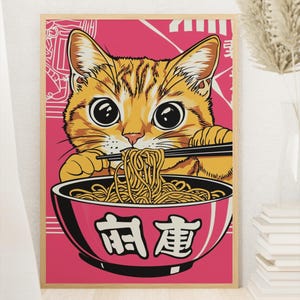 May include: A cartoon illustration of a cat eating ramen noodles from a red bowl with chopsticks. The bowl has the Japanese characters "Ramen" written on it. The background is pink.