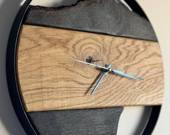 Handmade wall clock made of amber oak and wrought iron