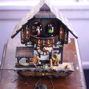 Vintage Regula Black Forest Cuckoo Clock: German Village Mechanical Wall Clock