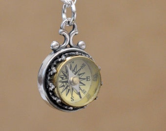 Working compass necklace for a woman deals