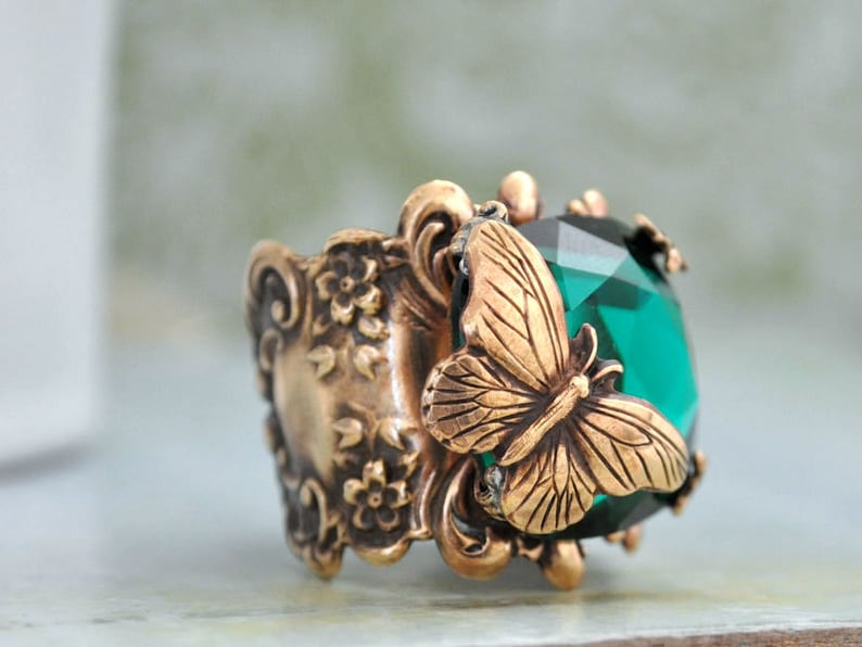 BUTTERFLY IN MOTION Neo Victorian vintage style brass ring with butterfly and Swarovski Emerald green glass cab image 1