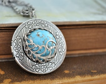 locket necklace, antiqued silver plated brass locket, ROBIN'S NEST, blue turquoise color vintage glass cab necklace, feather necklace,