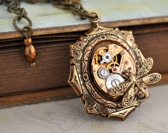 steampunk necklace - TIME TRAVELER - vintage gold color watch movement necklace with tiny dragonfly