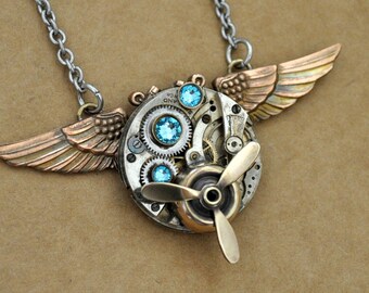steampunk wing necklace, AVIATION, vintage watch movement necklace with vintage brass military wing badge and movable propeller