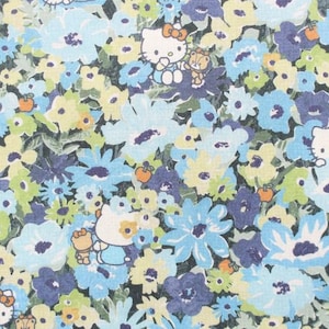 May include: A fabric pattern featuring a dense floral print in shades of light blue, dark blue, yellow, and green. The design includes small orange accents and repeated illustrations of the character Hello Kitty wearing a bow, interspersed among the flowers.