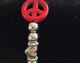 Unieke vredestekenarmband met kralen