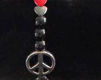 Kralenarmband vredesteken