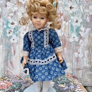 porcelain vintage Franklin Mint Heirloom character blonde doll in blue dress 90’s collectible
