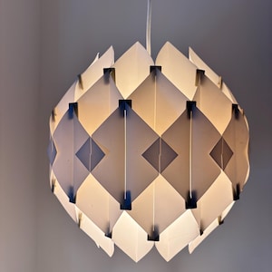 The “Silhouett” pendant lamp designed in 1968 by Danish designer Lars Schiøler for Hoyrup
