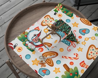 Papel de regalo navideño: Papá Noel festivo, árboles y galletas