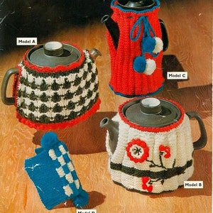 May include: Four vintage teapots with knitted covers in various designs. Model A features a black, white, and green pattern with red trim. Model B has a white cover with red floral accents. Model C is red with blue trim and pom-poms. Model D is a blue tea cozy.